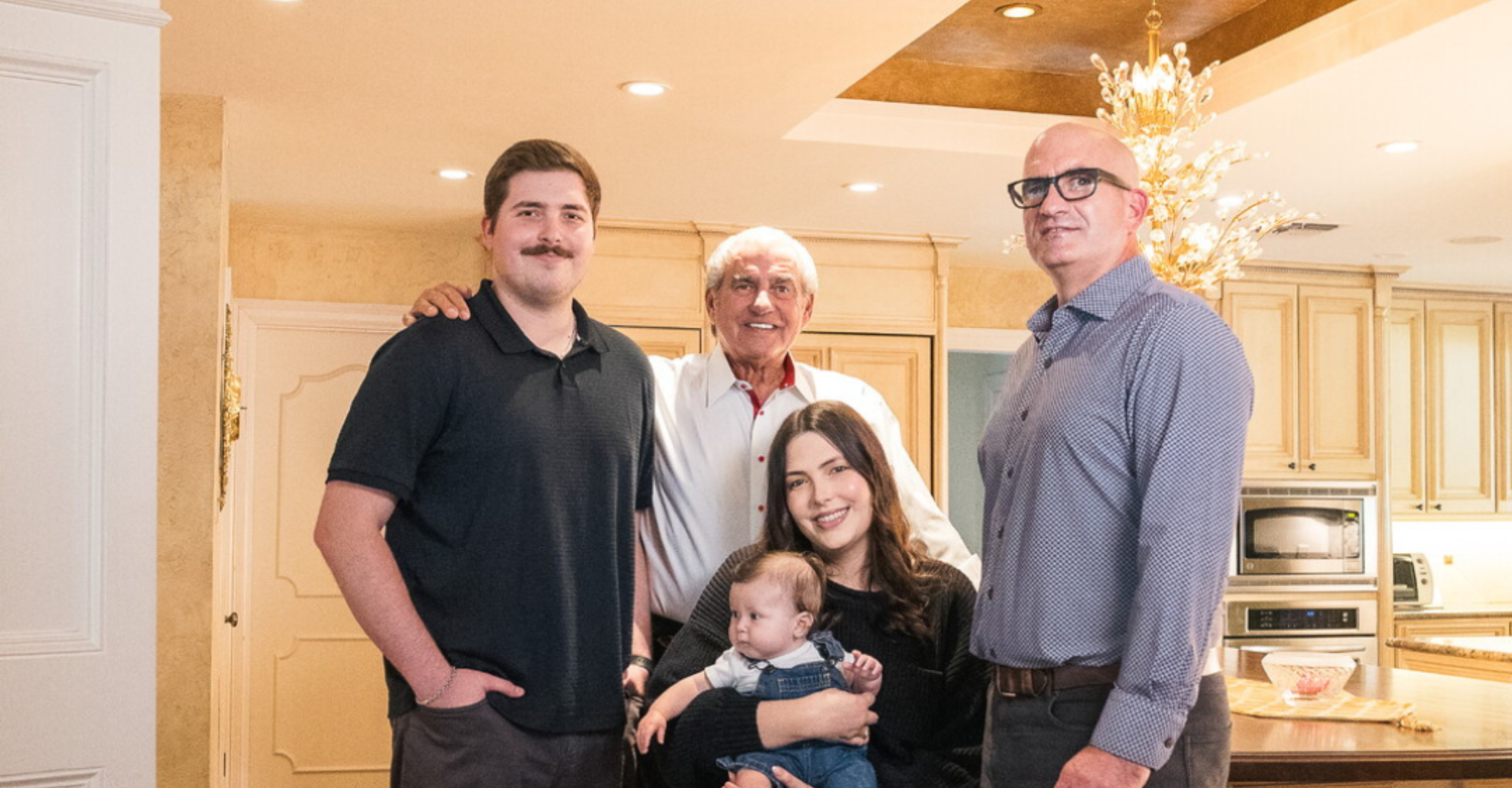 Hicks Flooring Carpet One Floor & Home in San Antonio Family picture. Generations of Hicks Flooring Owners in kitchen.